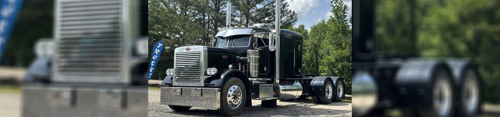 County Road 12 Truck Sales Black peterbilt truck right view